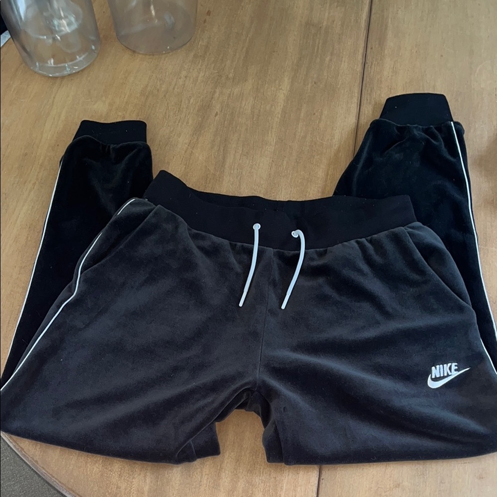 Nike Black Sweatpants with Tapered Fit and Elastic Cuffs